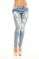 Low Rise Distressed Skinnies - Light Denim