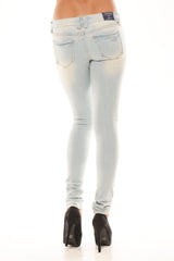 Ultra Low Rise Distressed Skinnies - Light Wash